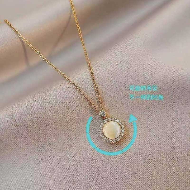 ROUND MOVING LOCKET